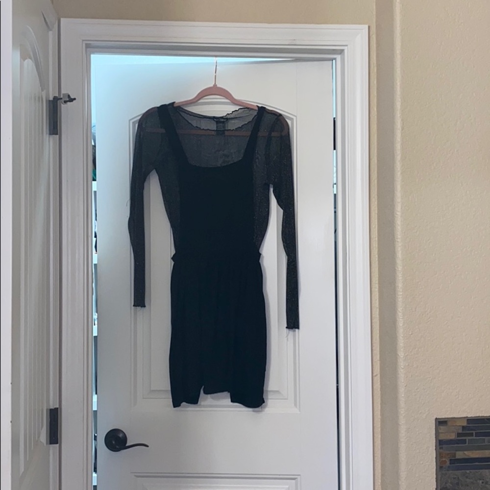 Cute mini black dress with adjustable straps!